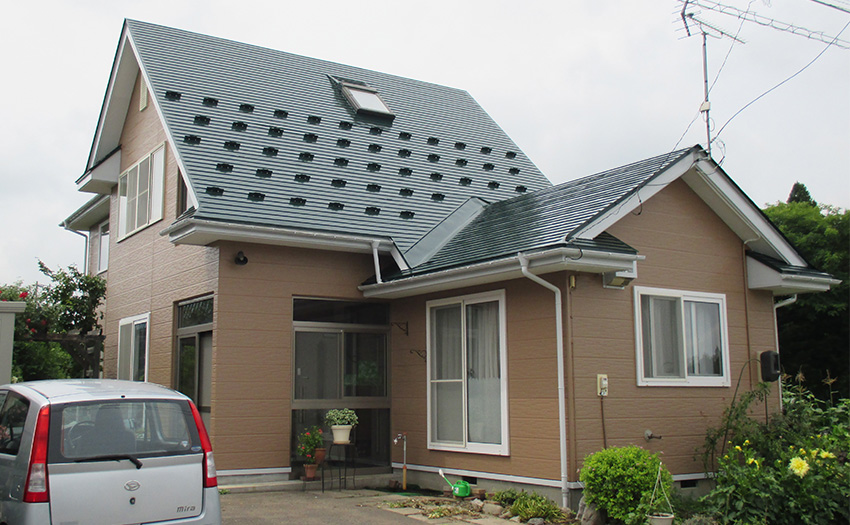 ブラウンの外壁の戸建て住宅